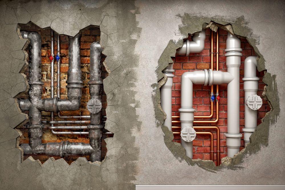 Comparison of old and new plumbing in exposed wall sections showcasing piping upgrades.